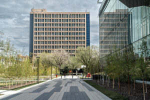 Social Sciences Building at the University of Calgary in Calgary, Alberta. Opened in 1969 as part of the university’s early campus expansion, the tower is now an example of how older academic buildings are being renewed as part of campus decarbonization. In 2023, UCalgary completed the installation of 1,100 square metres of solar photovoltaic panels on the building’s south façade, creating a 225-kilowatt system expected to cover about 90% of the building’s electrical load. The project formed part of a broader recladding effort to replace aging precast concrete panels, improve the building envelope and extend the useful life of a major mid-century campus building. It is part of the clean energy buildout because it shows that emissions reductions on large campuses depend not only on new high-performance buildings, but also on practical retrofits to the existing building stock that still shapes daily energy use. Social Sciences Building - University of Calgary